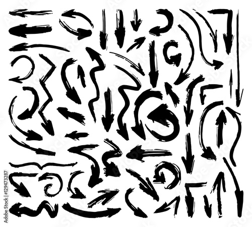 Hand drawn paintbrush vector arrows. Grunge arrow set on white