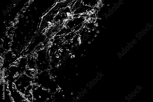 water splash isolated on black background © hideto111