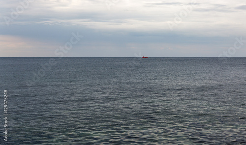 Seascape with entertainment semisubmarine sailing in Adriatic Sea.