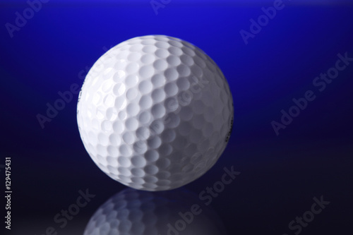 Golf Ball on blue Background