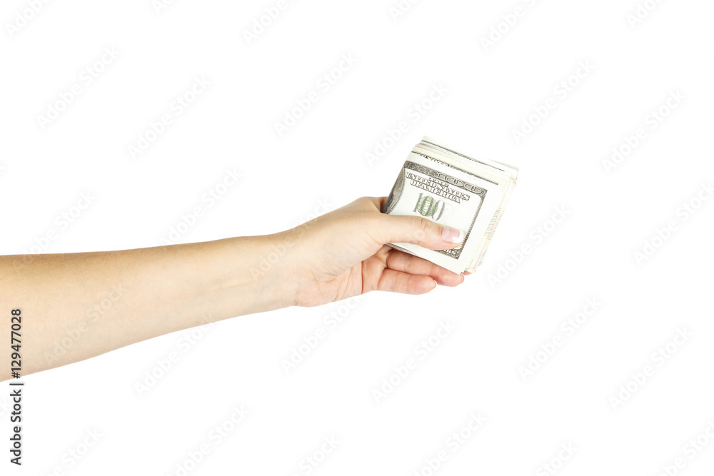 Female's hand holds stack of dollars on white background. Female's hand holds stack of dollars on white background.