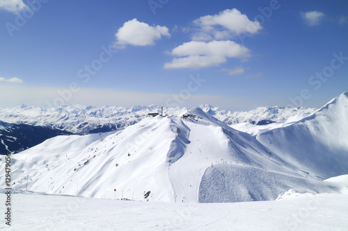 ski and snowboard slopes on top of high mountains, La Plagne, Alps, Paradiski, France. photo