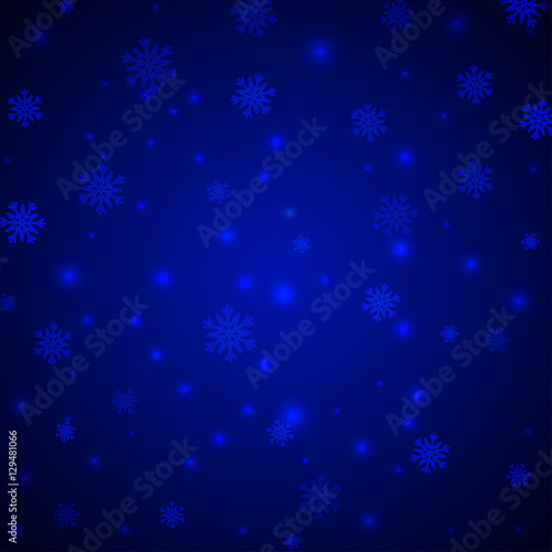Christmas blue background with snowflakes and glitter