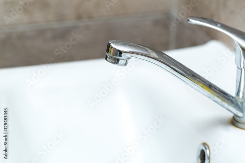 Close up of tap in sink