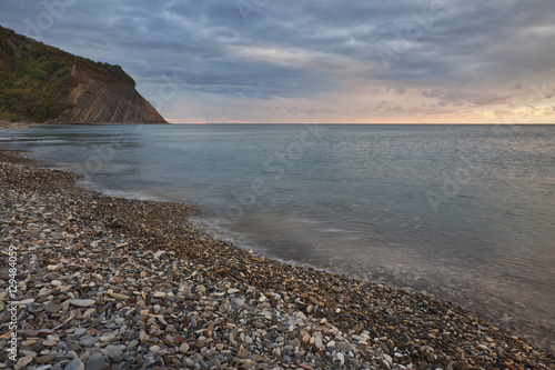 Fototapeta Naklejka Na Ścianę i Meble -  Evening landscape. The Black Sea and stone coast in Arhipo-Osiovka, Russia