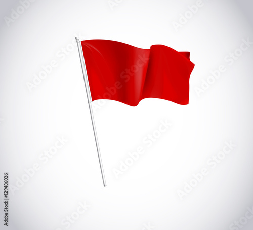 Red flag on flagpole isolated on white background.  Flag flying photo