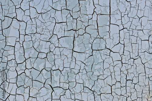  Background with cracked white paint.