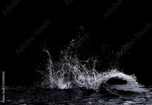 Fototapeta Naklejka Na Ścianę i Meble -  water splash isolated on black background