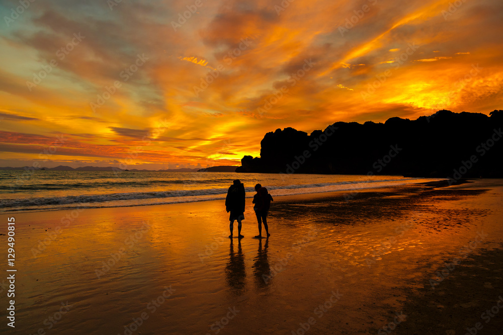 Sunset couple on the beach