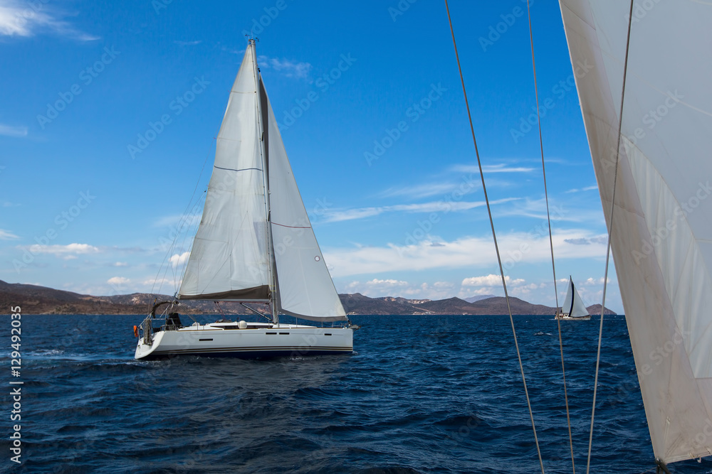 Obraz premium Sailing boats competitors of regatta. Yachting.