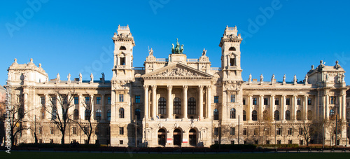 Hungarian National Museum of Ethnography, aka Neprajzi Muzeum, at Kossuth Lajos Square in Budapest, Hungary, Europe. Front view of entrance portal with two towers and architectural columns on sunny photo