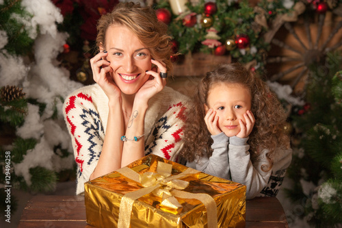 mother gives gifts to his beloved daughter