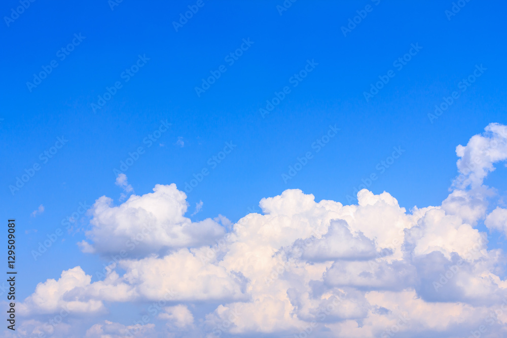 Blue sky background with white clouds and rain clouds. The vast blue sky and clouds sky on sunny day. White fluffy clouds in the blue sky. Blue sky background with white clouds and rain clouds. The vast blue sky and clouds sky on sunny day. White fluffy clouds in the blue sky.
