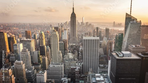 Aerial view of Manhattan skyline. From day to night. Timelapse.