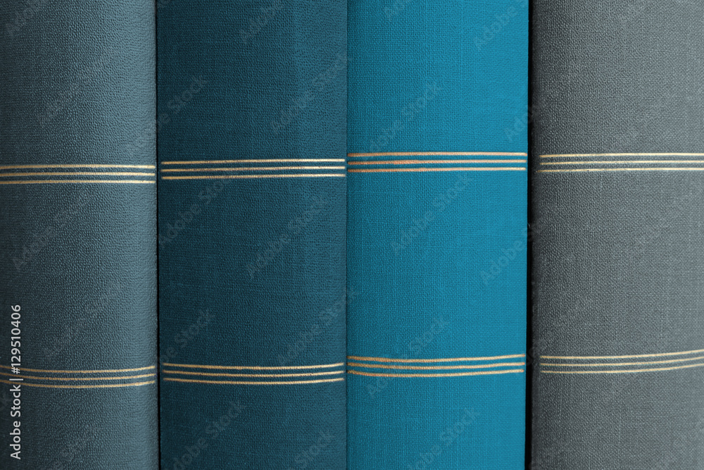 Naklejka premium stack of books, book spines in row