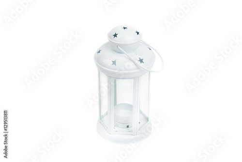 White lantern. Candlestick in the form of retro lamp. Whitecandle holder/ lamp. An isolated object on white background. Top  view. Closeup. photo