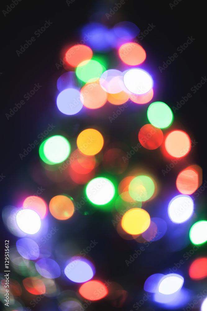 Christmas tree. Abstract background of light bokeh. New Year