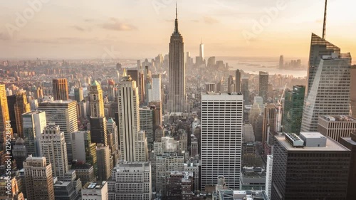 Aerial view of Manhattan skyline. Zoom in. Sunset. Vintage. Time lapse.