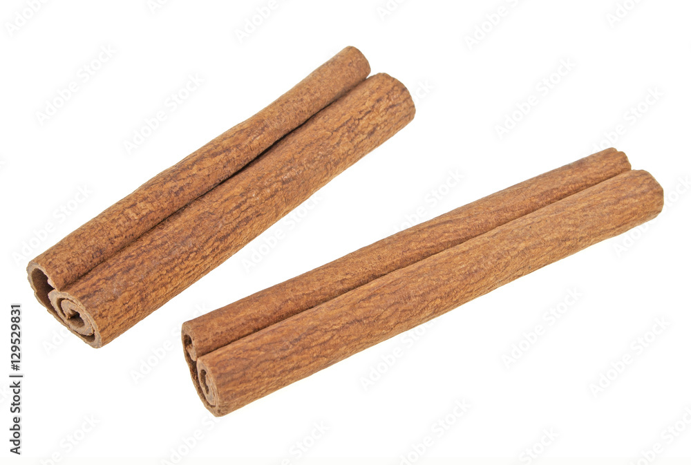 Two cinnamon sticks isolated on white background Two cinnamon sticks isolated on white background