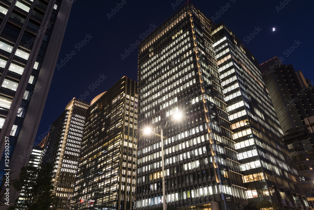 Cityscape of buildings and lights at Marunouchi, Tokyo, Japan at night. Cityscape of buildings and lights at Marunouchi, Tokyo, Japan at night.