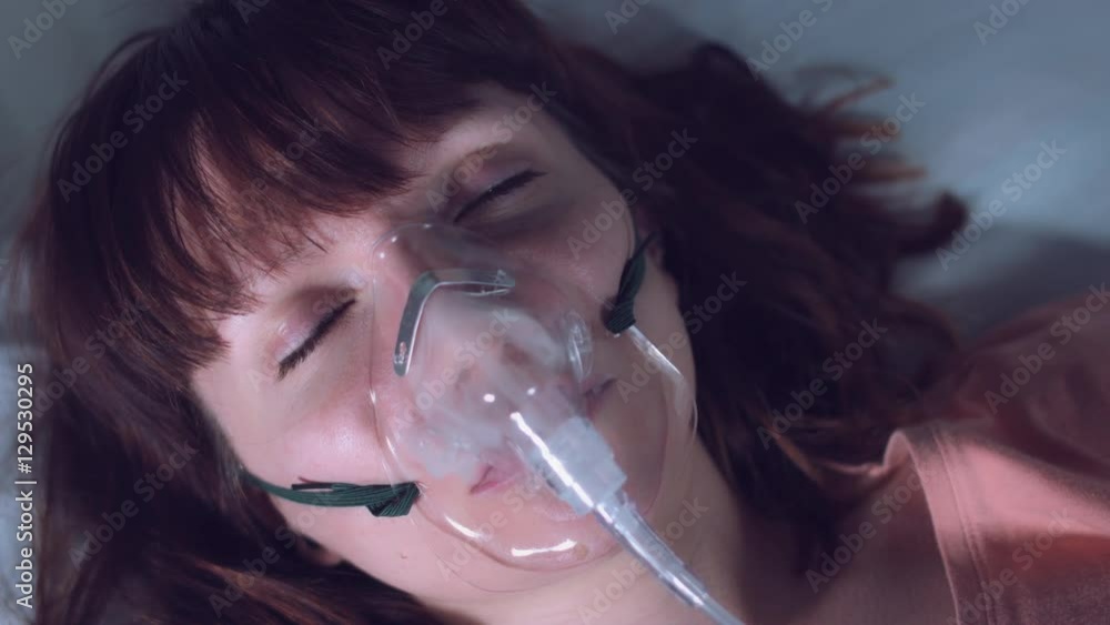 4k Hospital Shot of Sick Woman Poisoned By Smoke from Oxygen Mask Stock ...
