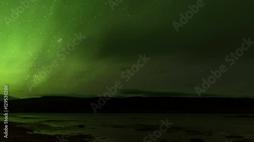 Northern lights in iceland at a lake