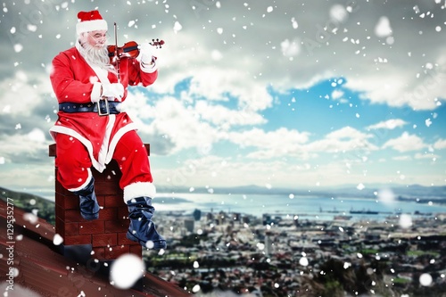 Composite image of smiling santa claus playing violin on chair