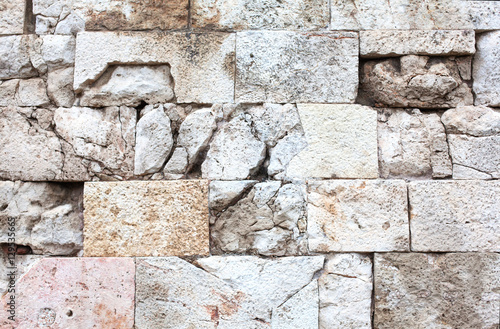 Ancient stone wall close-up.