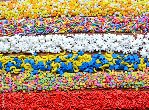 Lines of colorful sugar sprinkles
