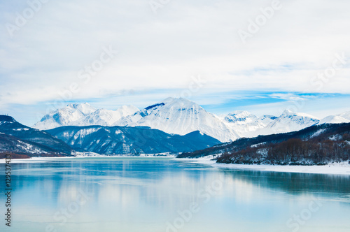 Winter landscape with a frozen lake