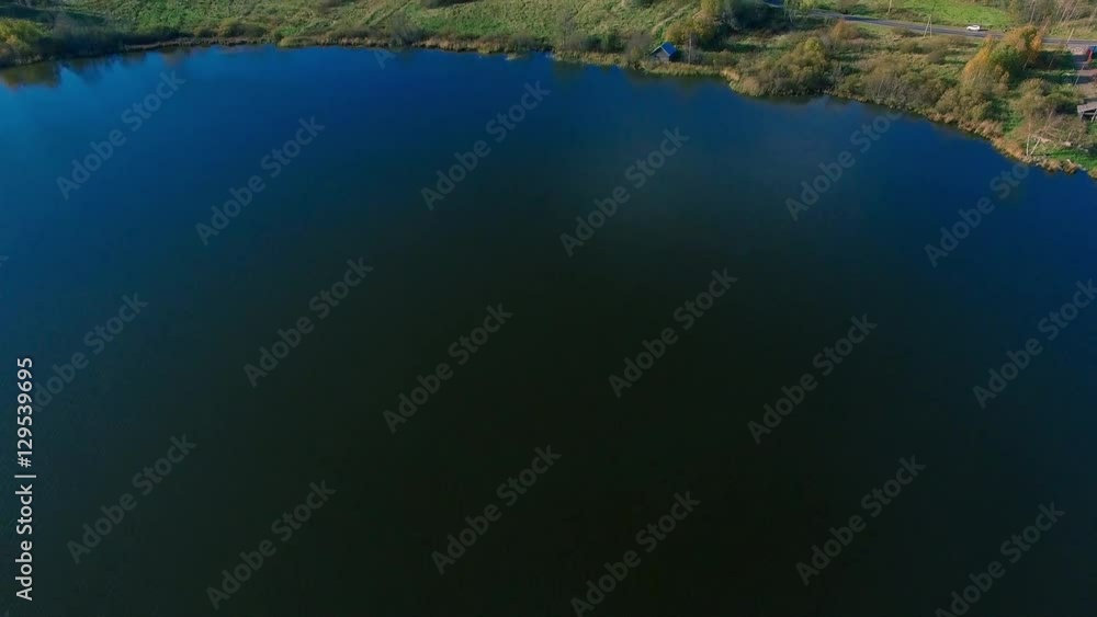 Aerial flight over lake and village in Karelia Aerial flight over lake and village in Karelia