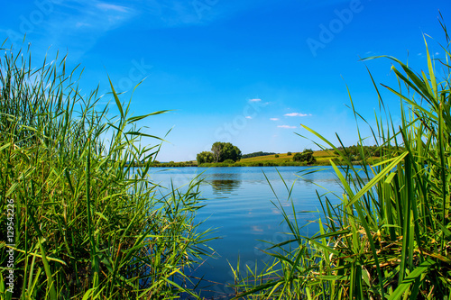 Photo of nature around beautiful blue lake