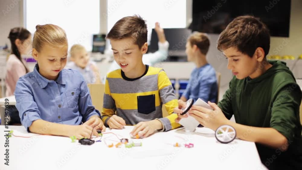 happy children learning at robotics school happy children learning at robotics school