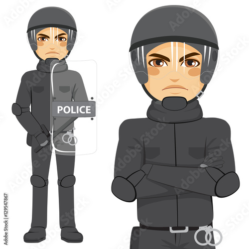 Young police man riot officer standing in uniform