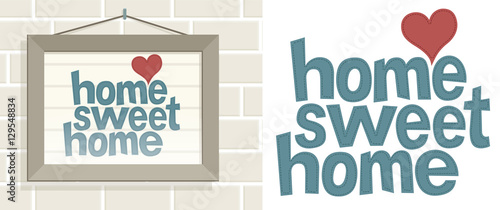 Home sweet home. A frame hung on the wall of the kitchen with the phrase Home sweet home.