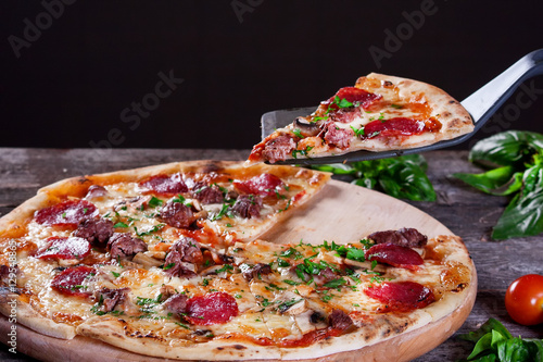 Pepperoni Pizza with salami, mushrooms , meat , beef and green o
