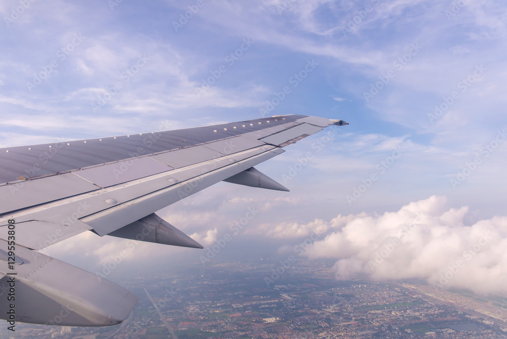 Obraz premium Blue sky and Clouds as seen through window of aircraft