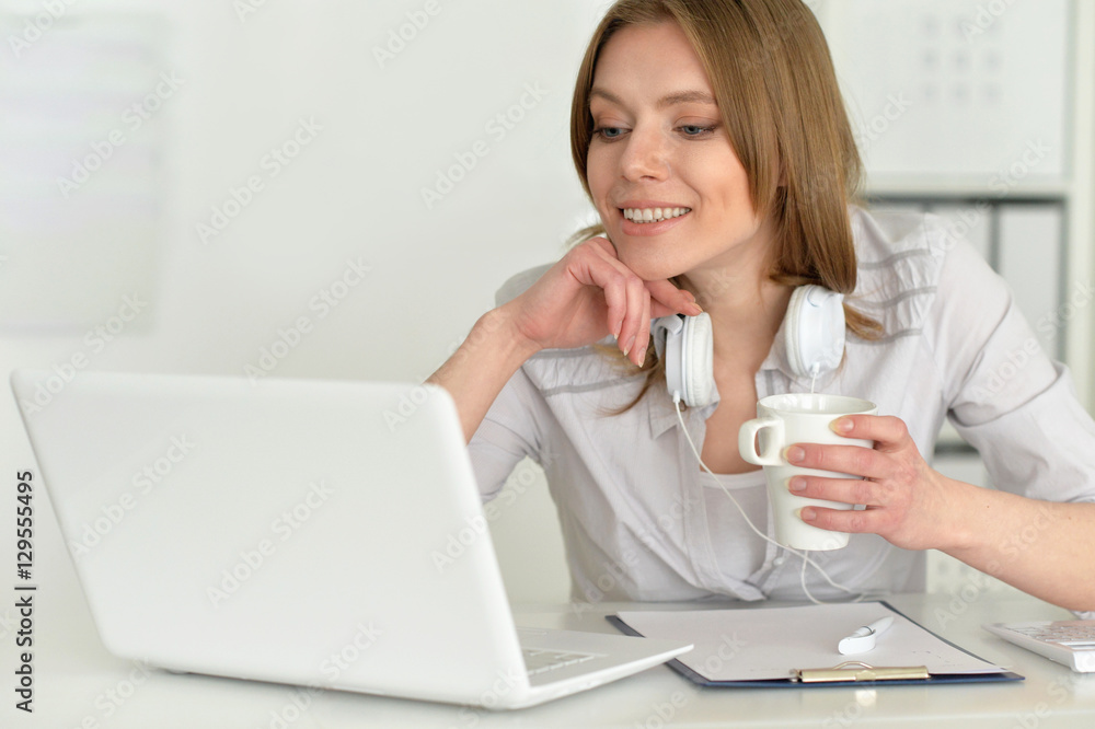 Young attractive businesswoman with laptop Young attractive businesswoman with laptop