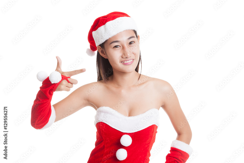 Asian Christmas Santa Claus girl point to blank space. Asian Christmas Santa Claus girl point to blank space.