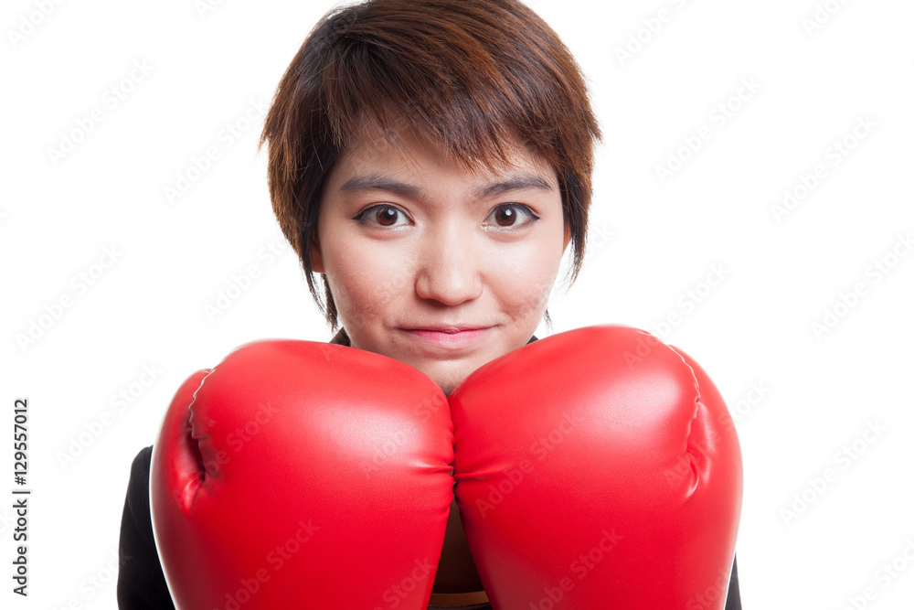 Young Asian business woman with red boxing gloves. Young Asian business woman with red boxing gloves.