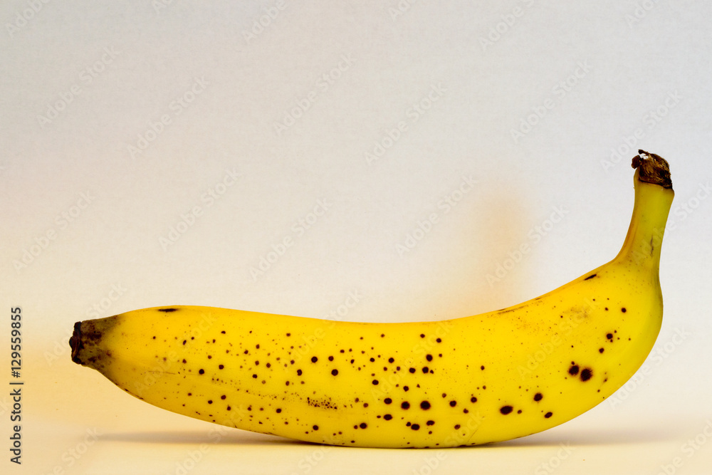 Single bio banana photo isolated with white background Single bio banana photo isolated with white background