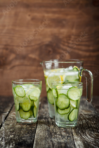 Detox water with cucumber and lemon .