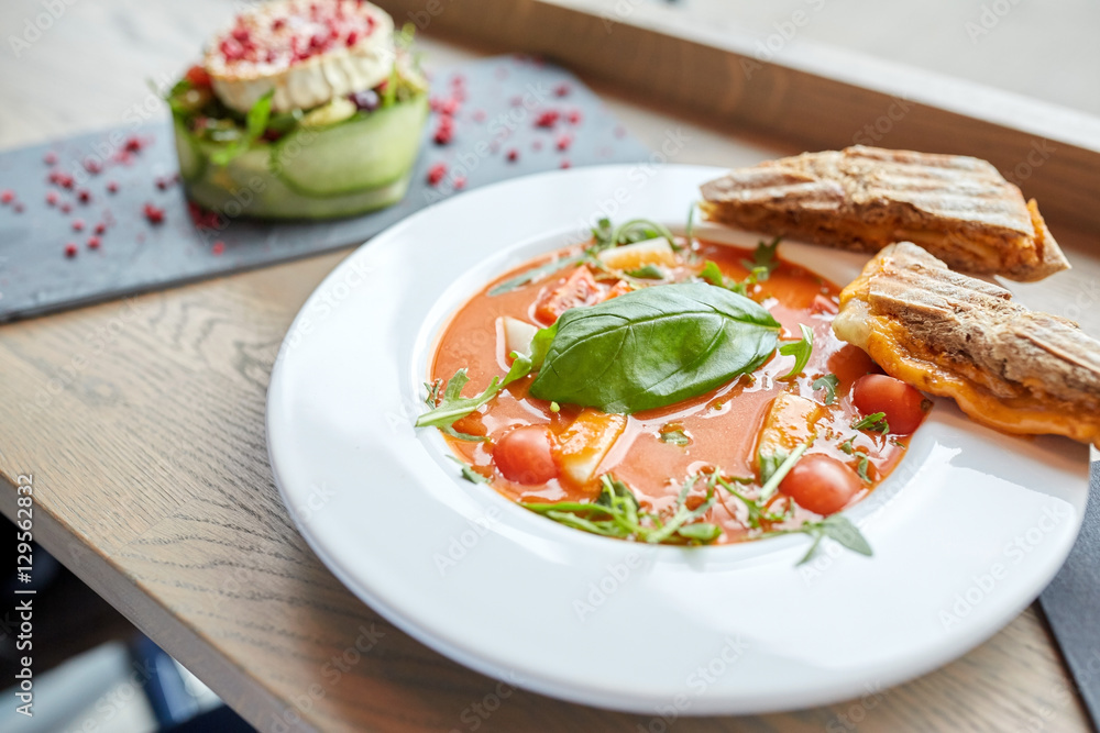 plate of delicious gazpacho soup at restaurant plate of delicious gazpacho soup at restaurant