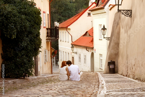 Photography Young couple walking in old town of Prague