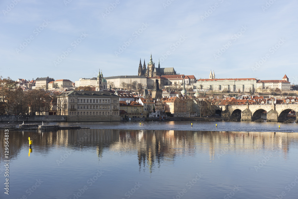 Fototapeta premium Autumn Lesser Town of Prague with gothic Castle and Charles Bridge, Czech Republic