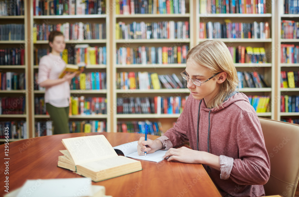 Doing assignment in library Doing assignment in library