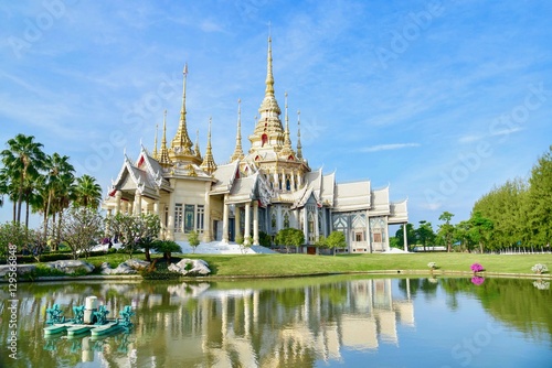 Magnificent Buddhist Monastery of Wat Non Kum and Its Reflection in Nakhon Ratchasima Province, Thailand © panithi33