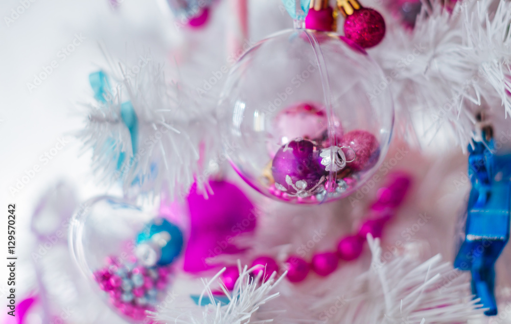 The pink balls hang on the Christmas Tree The pink balls hang on the Christmas Tree