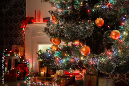 Beatiful christmas decorated tree in shining lights