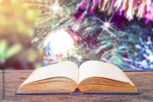 Open book with Christmas background